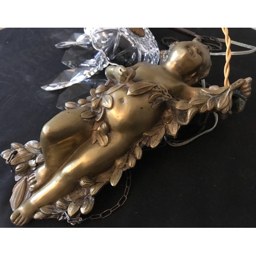 558 - Brass hanging ceiling light, cherub suspended on chain with glass droplet fittings, cherub approx 29... 