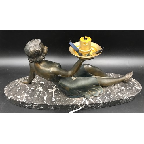 559 - Art Deco style table lamp, bronze effect spelter lady figure on black marble base. 22 h x 45 x 14cms... 