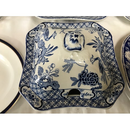 89 - A mixed selection of blue and white dinner ware to include 3 tureens, Wood & Sons Yuan pattern and 3... 