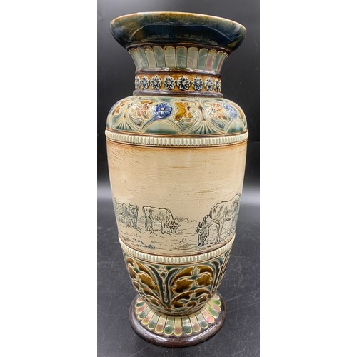 95 - A Doulton vase with sgrafitto design of cattle and horses by Hannah Barlow. 35cms h.