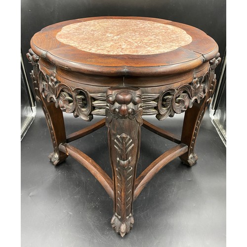 1216 - A Chinese hardwood stand with decorative marble inlay top. 45cms h x 50cms w.