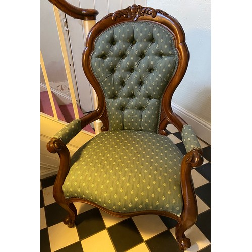 1222 - A Victorian mahogany framed button upholstered armchair with carved back. Height to seat 38cms, heig... 