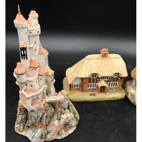 104 - A Lilliput Lane collection to include Castle of the Red Knight, Honeysuckle Cottage, Preston Mill, C... 