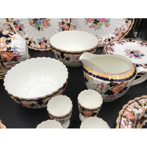 108 - A Brownfield circa 1890 part tea/ dinner ware with floral pattern to include: 2 oval plates 34 and 2... 