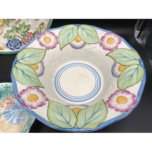 110 - A floral patterned pottery selection to include a Radford charger 31cms d, Hanley bowl 27cms d, Wood... 