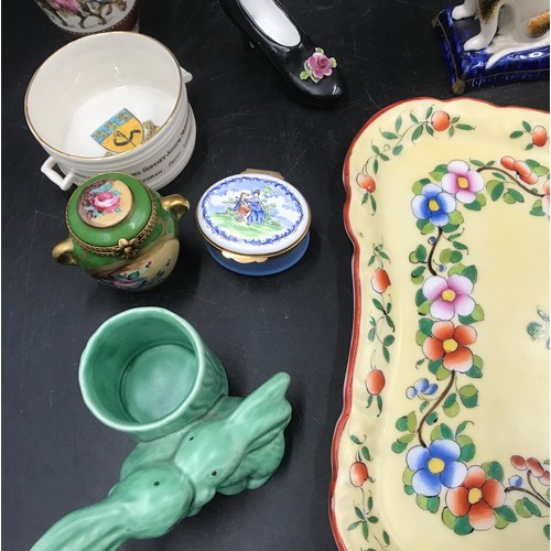 112 - A mixed selection of small pottery items to include Royal Winton 