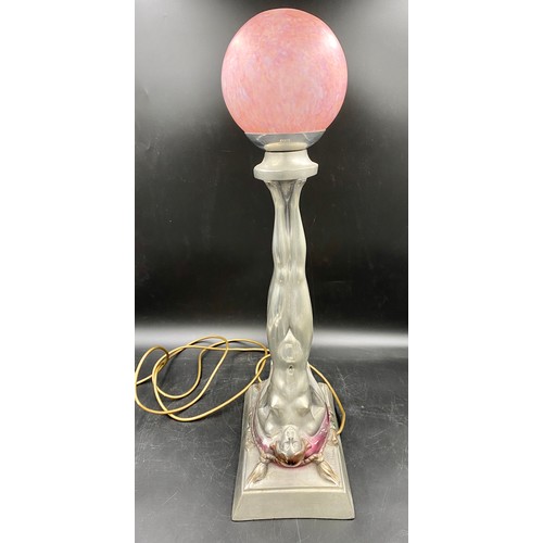 560 - A white metal table lamp in an Art deco style in the form of two ladies. Stamped RD 82532 to base. H... 