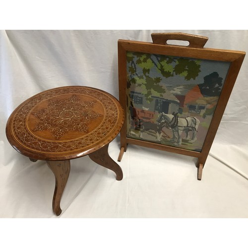 1215 - An Indian hardwood inlaid table with tripod folding base and circular top, 45cms h x 46cms w togethe... 