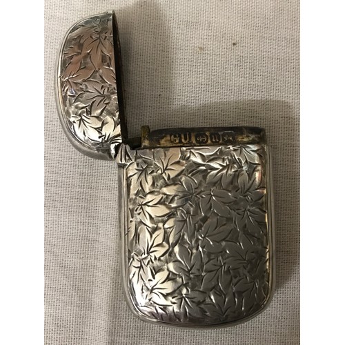 537 - A silver vesta case with leaf decoration and vacant cartouche, GU Birmingham 1894, 19gms.