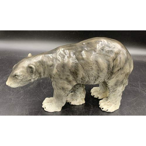 99 - A Continental figure of a walking polar bear. 33cms l.