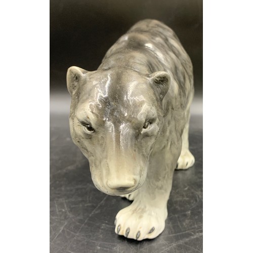 99 - A Continental figure of a walking polar bear. 33cms l.