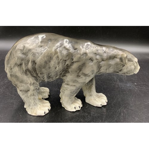 99 - A Continental figure of a walking polar bear. 33cms l.