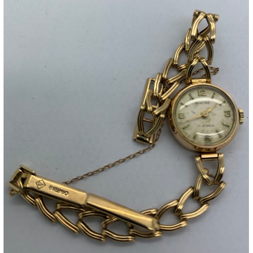 651 - A 9ct gold Baume ladies wristwatch and strap. Total weight 11.8gms.