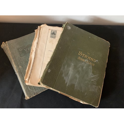 613 - Three vintage partially fitted stamp albums of United Kingdom and world stamps.