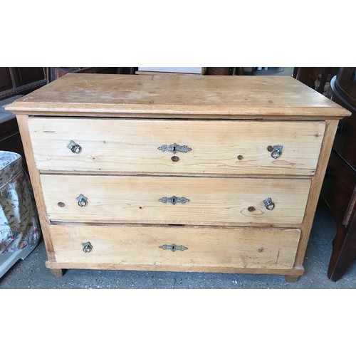 1257 - A pine chest of 3 long drawers, 114 w x 59 d  x 80cms h.