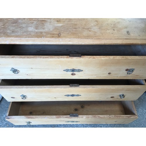 1257 - A pine chest of 3 long drawers, 114 w x 59 d  x 80cms h.