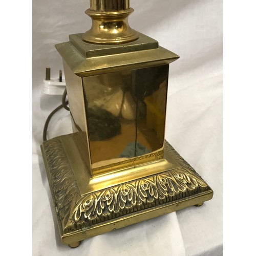 552 - A tall brass table lamp with Corinthian column on a square base. Approx 70cms h to light fitting. Ba... 