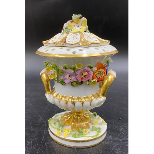 59 - Three pieces of Bloor Derby porcelain to include a pair of floral urns 18cms together with a lidded ... 