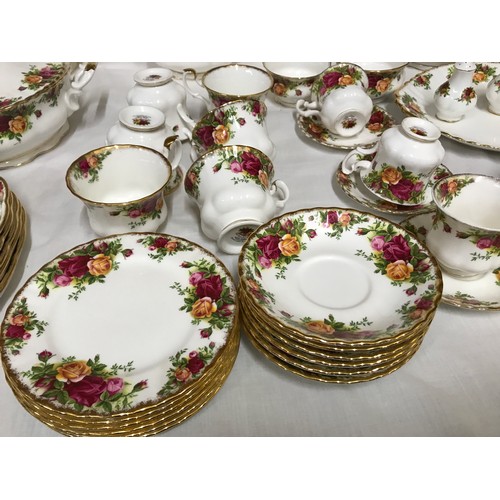 67 - Royal Albert Old Country Roses tea and dinner ware to include : tea and coffee pot, sauce jug, 2 sug... 