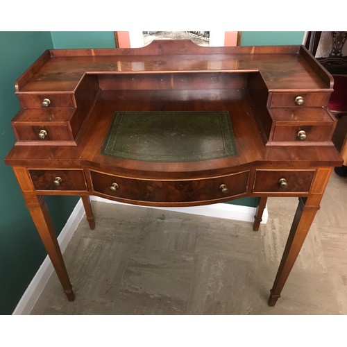 1268 - Reproduction walnut desk, shelf and drawers to top, green leather inlet, square taper legs, height t... 