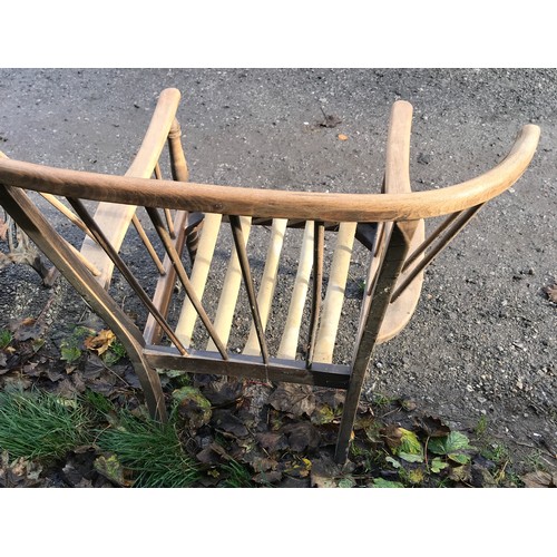 1238 - A beech wood framed stick back armchair. No cushion. Ht to seat 37cms, width at back 84cms, ht to ba... 