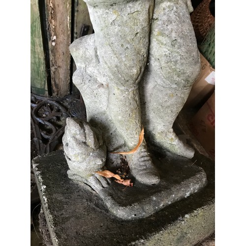 1324 - A concrete statue of a Georgian boy approx. 80cms h, 36cms x 39cms at base.