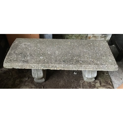 1327 - A concrete garden bench with rectangular top on a twin base decorated with grapes. 105cms w x 41cms ... 