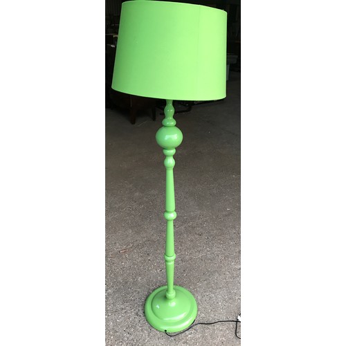 548 - Green metal standard lamp with green shade, approx 164cms h.