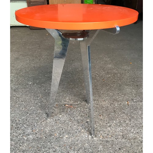 1241 - Mid century polished steel based circular side table, orange laminated top, tripod base. 60 w  x 72c... 