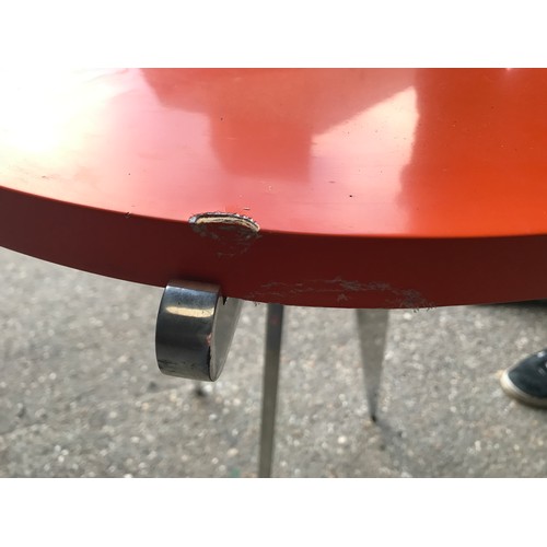 1241 - Mid century polished steel based circular side table, orange laminated top, tripod base. 60 w  x 72c... 