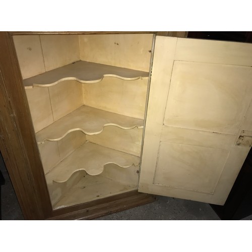 1242 - Large pine corner cupboard, shelved interior. 117 h x 78 w x 38cms d.