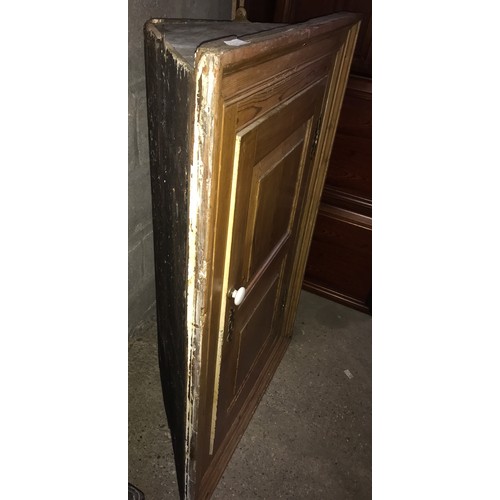 1242 - Large pine corner cupboard, shelved interior. 117 h x 78 w x 38cms d.