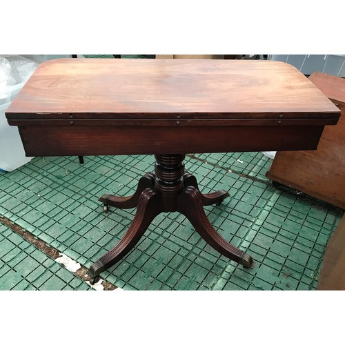 1255 - A mahogany fold over tea table with pedestal and 4 legs, measures 45cms w (90cms w fully extended) x... 