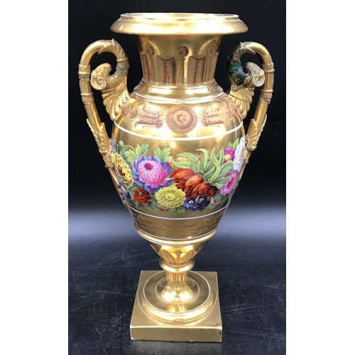 45 - A 19thC gilt and floral painted vase, rams head handles. 33 h x 18cms w at handles.