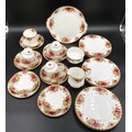 A selection of Royal Albert Country Roses to include cake plate 26cms d, 12 plates 21cms d, 6 side p... 