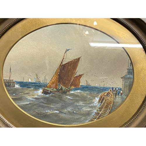 1103 - R T Wilding a pair of oval framed watercolours of coastal scenes Clovelly, Devon and Gorleston Harbo... 