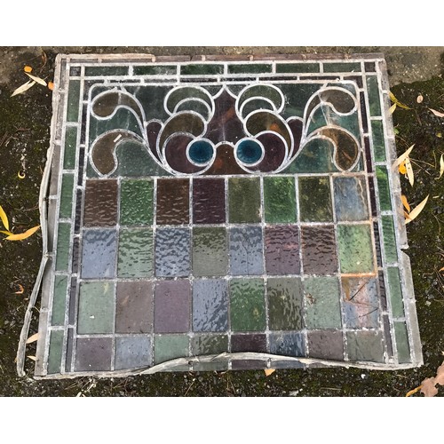 159 - Six coloured leaded glass window panels, largest multicoloured panel 78 x 72cms, one with painted mo... 