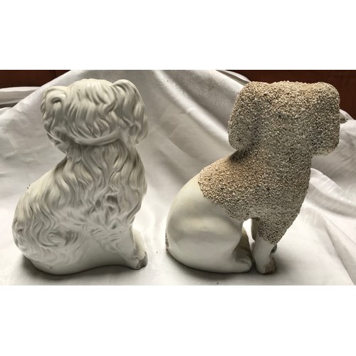 28 - Two Staffordshire pottery Spaniel dogs, 25cms h.
