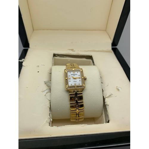 638 - A Raymond Weil 18 carat gold and diamond set ladies wristwatch in original display case with 18 cara... 