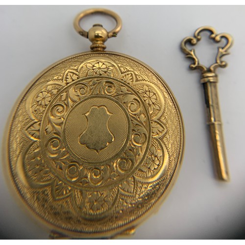 639 - An 18ct gold cased pocket watch with floral decorated face and winding key. 3.5cms d, total weight 3... 