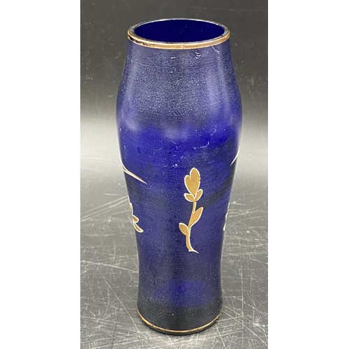 164 - A 19thC Bristol blue glass rolling pin 37cms l together with a blue and gilt vase 16cms h.