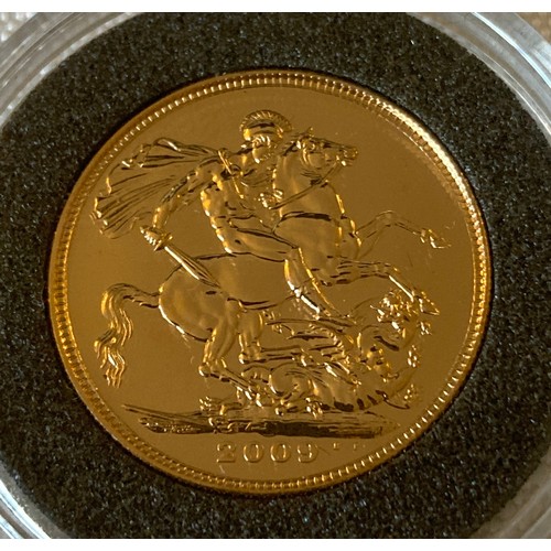 574 - Elizabeth II 2009 full Gold Sovereign in capsule.