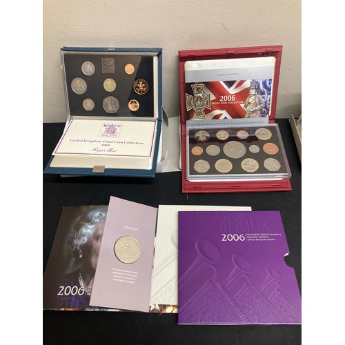 575 - The Royal Mint 2006 proof coin collection, a 1983 proof coin collection and a Vivat Regina 2006 5 po... 