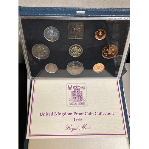 575 - The Royal Mint 2006 proof coin collection, a 1983 proof coin collection and a Vivat Regina 2006 5 po... 