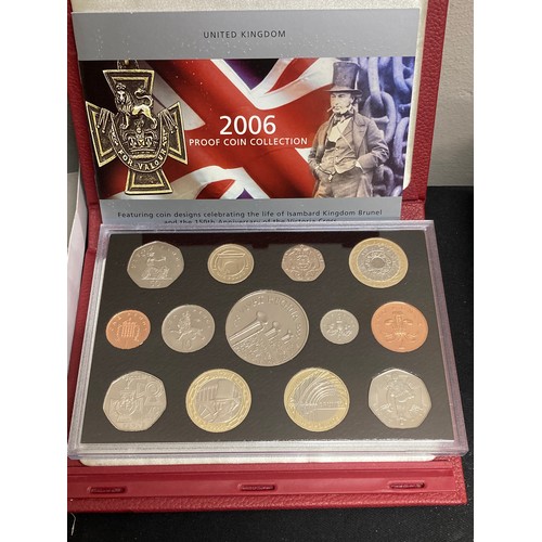 575 - The Royal Mint 2006 proof coin collection, a 1983 proof coin collection and a Vivat Regina 2006 5 po... 