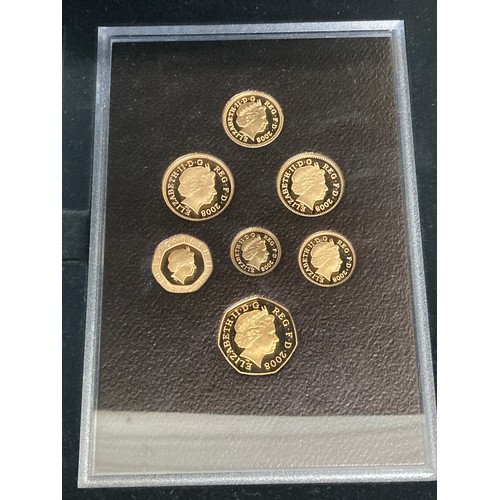 589 - 2008 UK GOLD PROOF COINAGE SET, comprising 1p, 2p, 5p, 10p, 20p, 50p and £1 coins, in a fitted woode... 