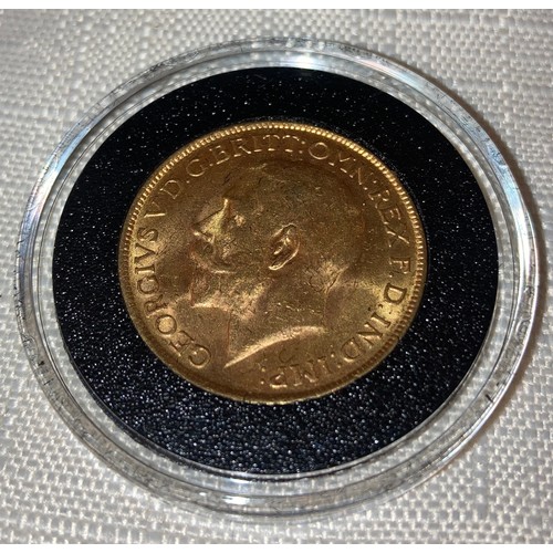 591 - George V 1927 full Gold Sovereign in capsule.