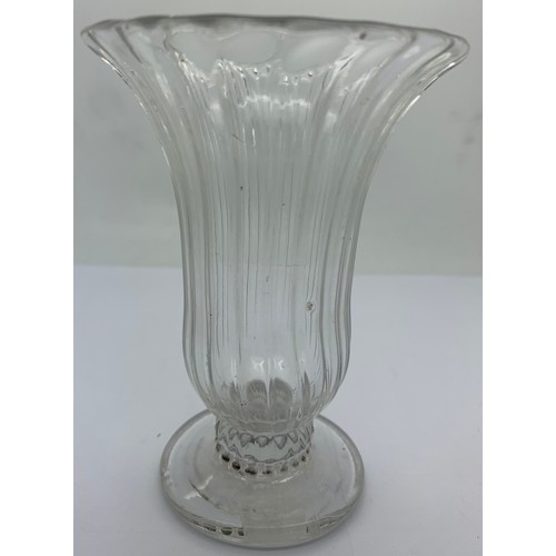 150 - A jelly glass with bell bowl closely wrythen moulded and conical foot with pontil mark. Circa 1770. ... 