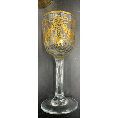 153 - A decanter and five wine glasses with gilt decoration in the manner of James Giles. Decanter of tape... 