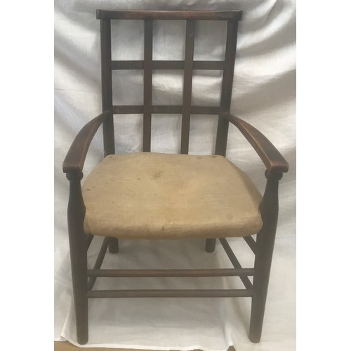 1306 - A beechwood framed child's slat back armchair. Height to seat 31cm, to back 65cm, width 39cm.